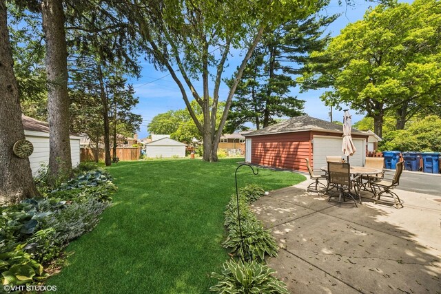 9326 S Millard Ave, Evergreen Park, IL 60805 - view of yard with an outbuilding, a patio, and outdoor dining area
