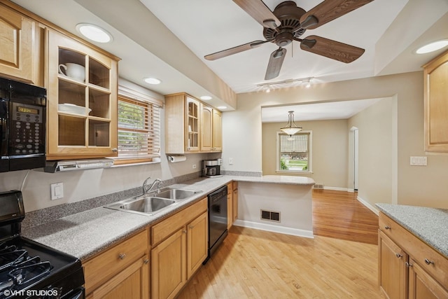 9326 S Millard Ave, Evergreen Park, IL 60805 - kitchen featuring black appliances, light wood-style floors, glass insert cabinets, ceiling fan, and light countertops