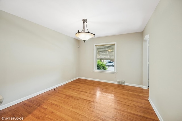 9326 S Millard Ave, Evergreen Park, IL 60805 - spare room with light wood-style floors and baseboards