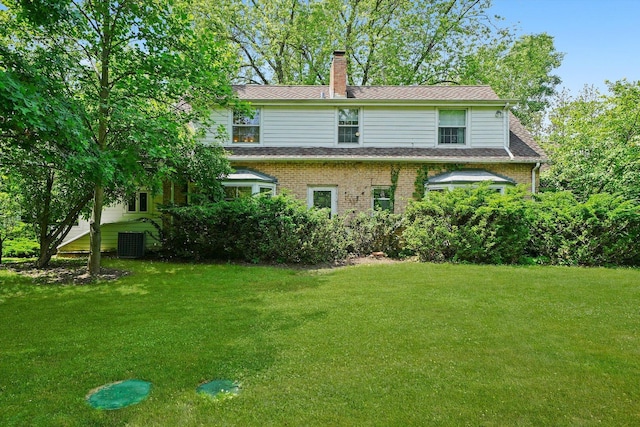 600 Riverwoods Rd, Mettawa, IL 60045 - rear view of property with a chimney, a lawn, and brick siding