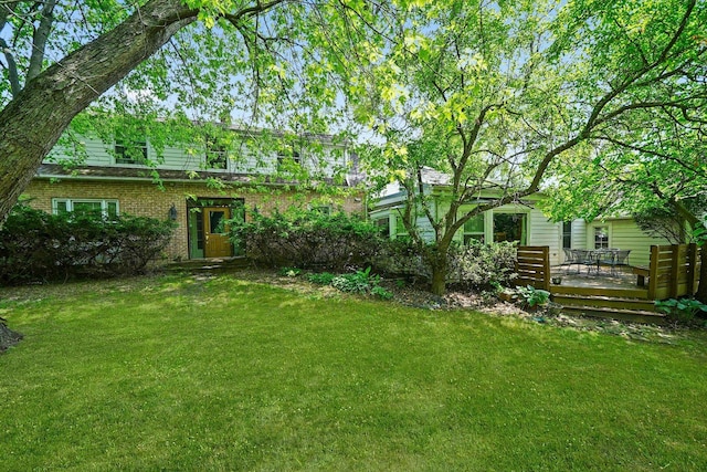 600 Riverwoods Rd, Mettawa, IL 60045 - view of green lawn with a wooden deck