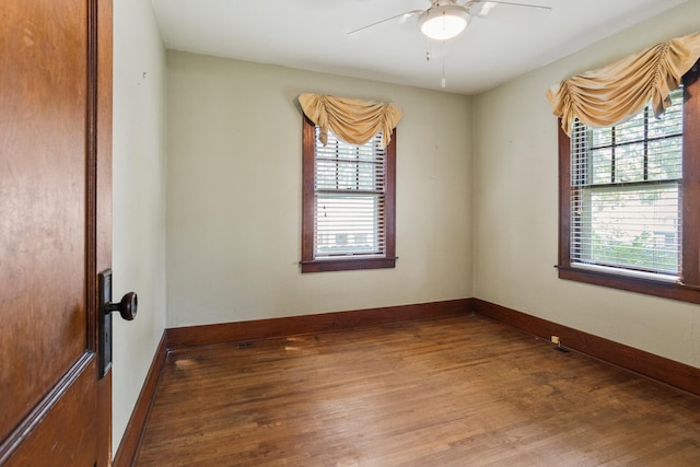 705 Arlington Ct, Champaign, IL 61820 - spare room featuring wood finished floors and ceiling fan