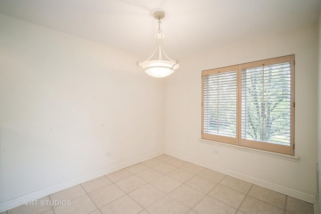 1660 1st St Unit 303, Highland Park, IL 60035 - spare room featuring baseboards