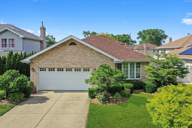 5724 W 82nd Pl, Burbank, IL 60459 - single story home featuring brick siding, driveway, an attached garage, and a front lawn