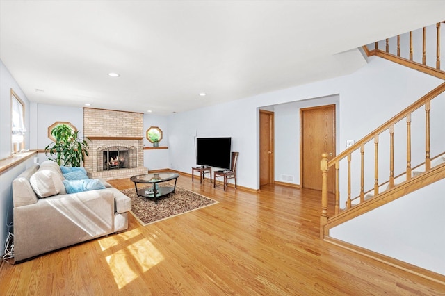 5724 W 82nd Pl, Burbank, IL 60459 - living area featuring wood finished floors, stairs, recessed lighting, and a fireplace