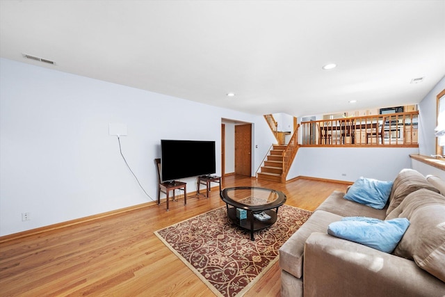 5724 W 82nd Pl, Burbank, IL 60459 - living area featuring stairway, wood finished floors, and recessed lighting