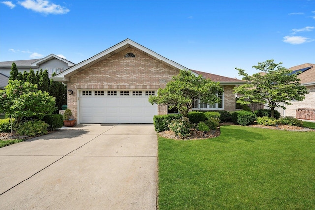 5724 W 82nd Pl, Burbank, IL 60459 - view of front of house featuring brick siding, driveway, a garage, and a front lawn