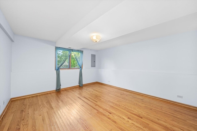 5724 W 82nd Pl, Burbank, IL 60459 - spare room featuring light wood-style flooring and electric panel