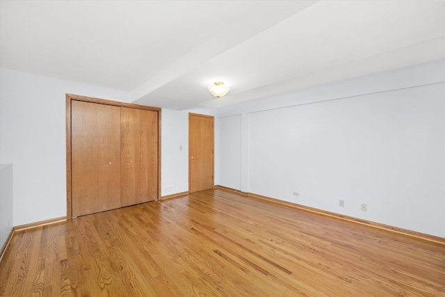5724 W 82nd Pl, Burbank, IL 60459 - unfurnished bedroom with light wood finished floors and baseboards