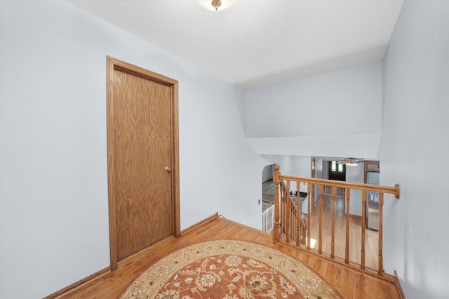 5724 W 82nd Pl, Burbank, IL 60459 - corridor with an upstairs landing and wood finished floors