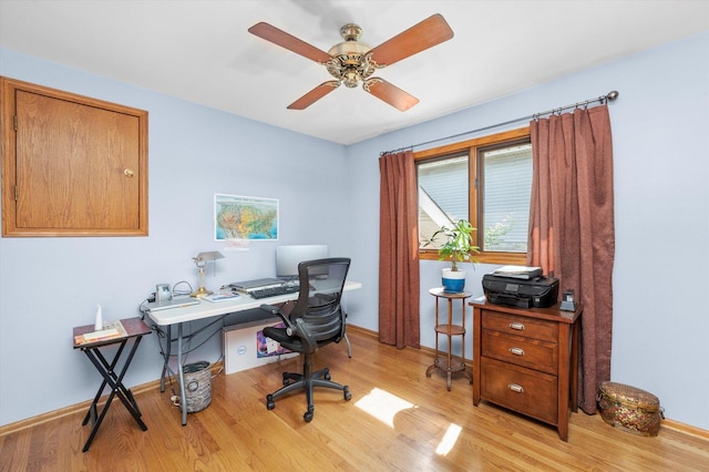 5724 W 82nd Pl, Burbank, IL 60459 - home office with light wood-style floors and a ceiling fan