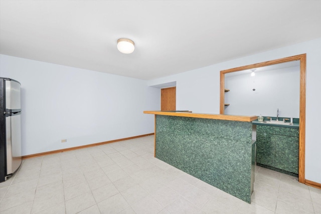 5724 W 82nd Pl, Burbank, IL 60459 - indoor bar with freestanding refrigerator and baseboards