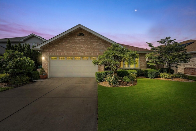 5724 W 82nd Pl, Burbank, IL 60459 - view of front facade with brick siding, a lawn, an attached garage, and concrete driveway