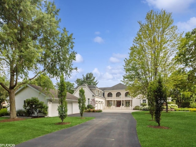 5N113 Burr Rd, Saint Charles, IL 60175 - traditional home with asphalt driveway, a garage, and a front yard