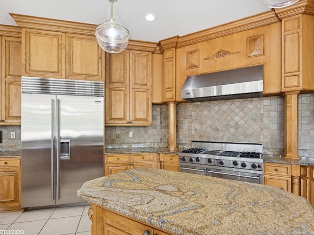 5N113 Burr Rd, Saint Charles, IL 60175 - kitchen with high quality appliances, wall chimney exhaust hood, light tile patterned floors, decorative backsplash, and light stone countertops