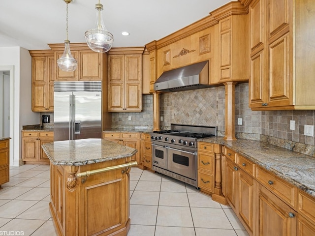 5N113 Burr Rd, Saint Charles, IL 60175 - kitchen featuring high end appliances, wall chimney range hood, light tile patterned flooring, a kitchen island, and light stone countertops