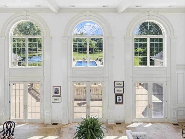 5N113 Burr Rd, Saint Charles, IL 60175 - doorway to outside with french doors, a towering ceiling, beam ceiling, light stone finish floors, and crown molding