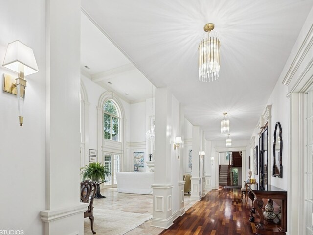 5N113 Burr Rd, Saint Charles, IL 60175 - hallway featuring a decorative wall, a chandelier, and a high ceiling