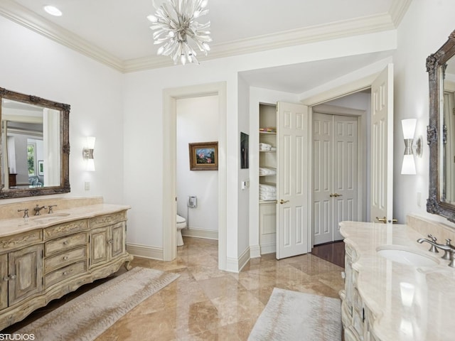 5N113 Burr Rd, Saint Charles, IL 60175 - bathroom featuring a chandelier, vanity, crown molding, marble tiled flooring, and a closet