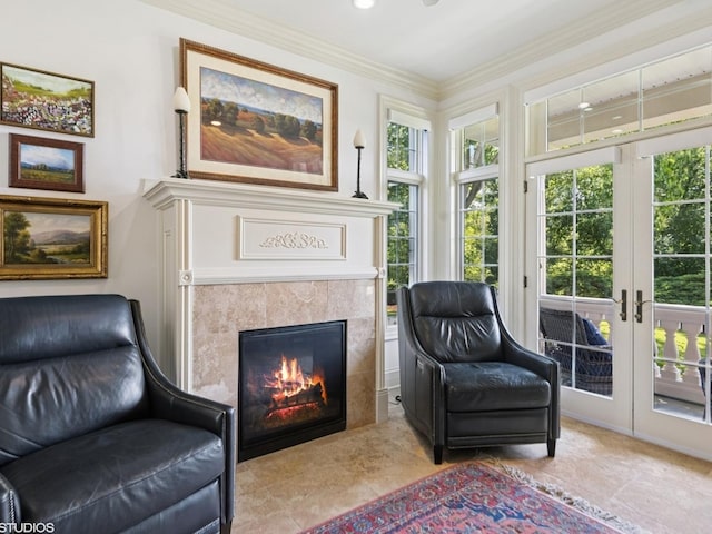 5N113 Burr Rd, Saint Charles, IL 60175 - sitting room with healthy amount of natural light, a tiled fireplace, french doors, and crown molding