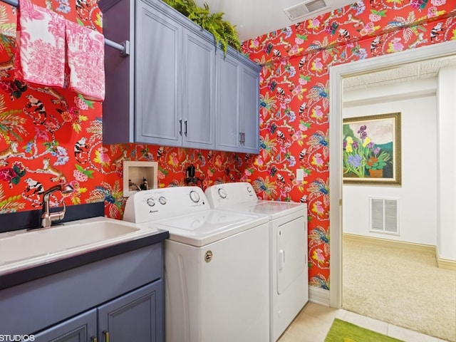 5N113 Burr Rd, Saint Charles, IL 60175 - laundry room featuring wallpapered walls, cabinet space, washing machine and clothes dryer, light tile patterned floors, and light carpet