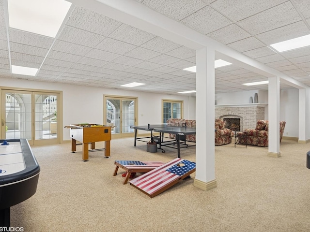 5N113 Burr Rd, Saint Charles, IL 60175 - playroom with carpet, a brick fireplace, and a paneled ceiling
