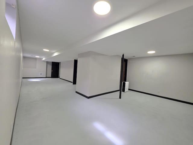 605 Tyler St, Genoa, IL 60135 - finished basement featuring baseboards and recessed lighting