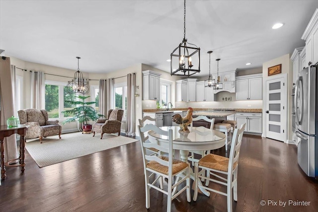 1075 Redbud Ln, Sugar Grove, IL 60554 - dining room with a chandelier, plenty of natural light, dark wood finished floors, and recessed lighting