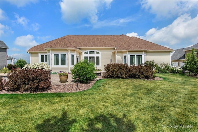 1075 Redbud Ln, Sugar Grove, IL 60554 - back of house with a lawn