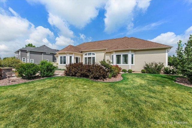 1075 Redbud Ln, Sugar Grove, IL 60554 - back of house with a lawn