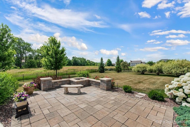 1075 Redbud Ln, Sugar Grove, IL 60554 - fenced backyard featuring a fire pit and a patio