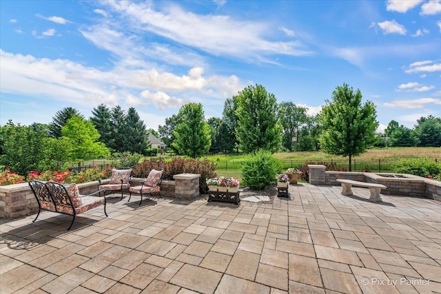 1075 Redbud Ln, Sugar Grove, IL 60554 - view of patio / terrace featuring an outdoor fire pit