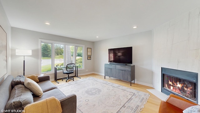 14352 Crystal Tree Dr, Orland Park, IL 60462 - living room featuring wood finished floors, recessed lighting, and a tiled fireplace