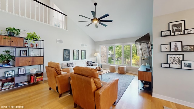 14352 Crystal Tree Dr, Orland Park, IL 60462 - living room featuring high vaulted ceiling, ceiling fan, and light wood finished floors