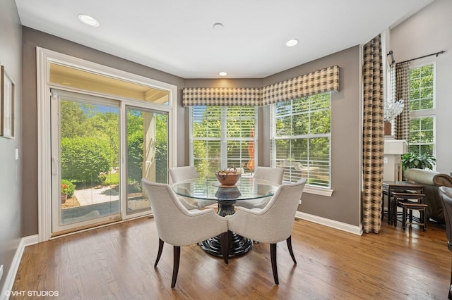 1613 Constitution Dr, Glenview, IL 60026 - dining area with healthy amount of natural light, wood finished floors, and recessed lighting