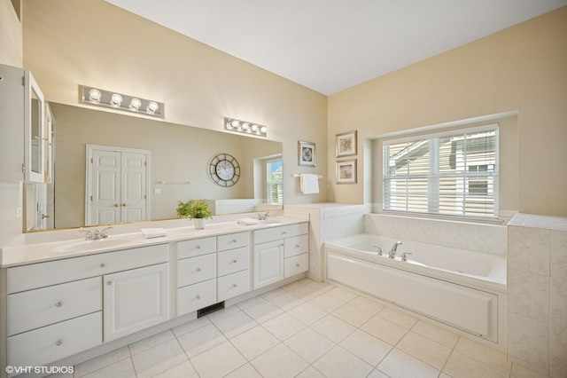 1613 Constitution Dr, Glenview, IL 60026 - bathroom featuring healthy amount of natural light, double vanity, a garden tub, and tile patterned flooring