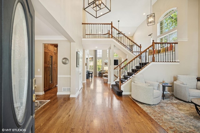1613 Constitution Dr, Glenview, IL 60026 - entryway with a towering ceiling, wood finished floors, stairway, and recessed lighting