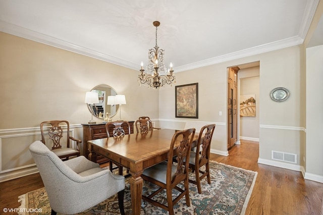 1613 Constitution Dr, Glenview, IL 60026 - dining area featuring a chandelier, ornamental molding, and wood finished floors