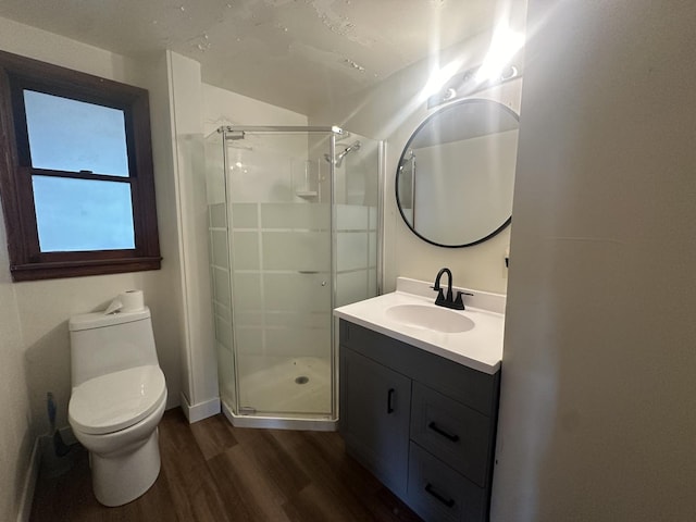 1506 17th Ave, Sterling, IL 61081 - bathroom featuring wood finished floors, vanity, and a stall shower
