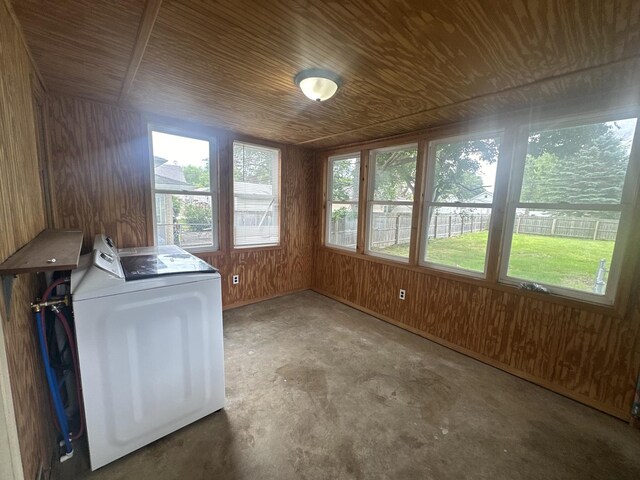 1506 17th Ave, Sterling, IL 61081 - laundry room featuring washer / dryer, wooden ceiling, and wood walls