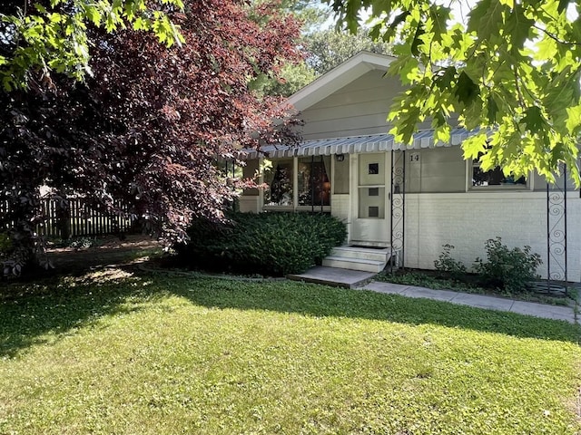 14 N Walnut St, Pesotum, IL 61863 - view of front facade with entry steps and brick siding