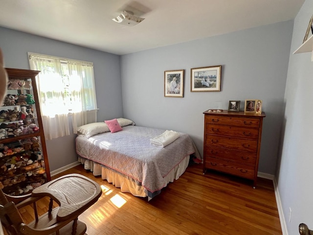 14 N Walnut St, Pesotum, IL 61863 - bedroom with light wood-style flooring and baseboards
