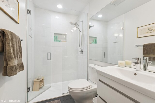 835 N Wood St Unit 301, Chicago, IL 60622 - full bathroom featuring vanity, a stall shower, recessed lighting, and tile patterned flooring