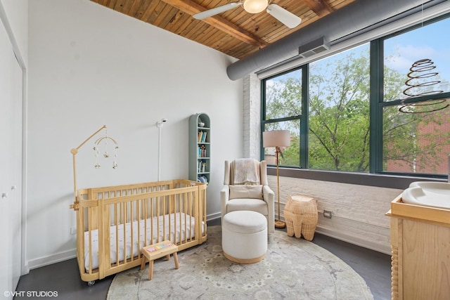 835 N Wood St Unit 301, Chicago, IL 60622 - bedroom featuring a wooden ceiling with exposed beams and a nursery area