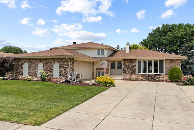 12026 Somerset Rd, Orland Park, IL 60467 - split level home with brick siding, an attached garage, a front yard, a chimney, and concrete driveway