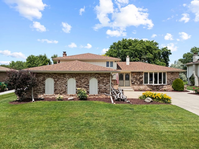 12026 Somerset Rd, Orland Park, IL 60467 - view of front facade featuring a chimney, a front lawn, a shingled roof, driveway, and brick siding