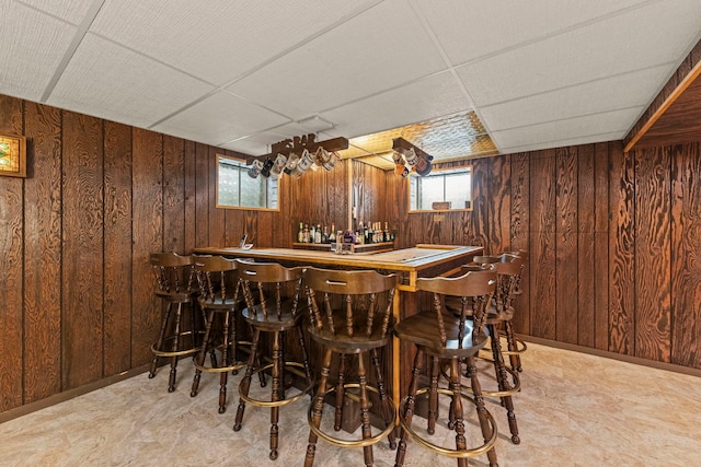 12026 Somerset Rd, Orland Park, IL 60467 - indoor bar featuring wooden walls, tile patterned floors, and plenty of natural light