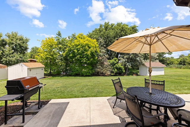 12026 Somerset Rd, Orland Park, IL 60467 - view of patio / terrace featuring a storage shed, a grill, outdoor dining space, and view of wooded area