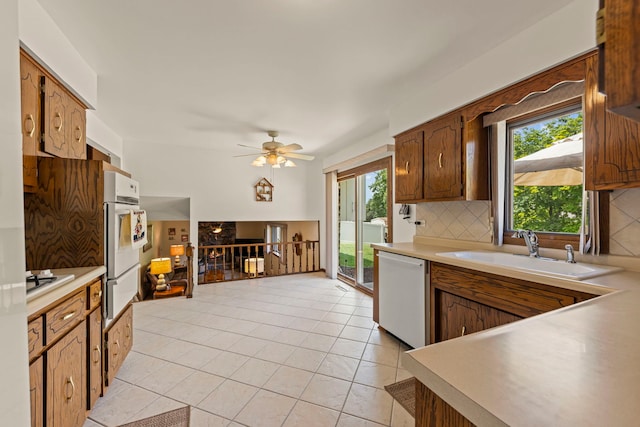 12026 Somerset Rd, Orland Park, IL 60467 - kitchen featuring white appliances, plenty of natural light, and light countertops