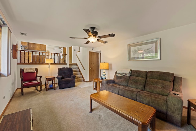 12026 Somerset Rd, Orland Park, IL 60467 - carpeted living room featuring stairway and a ceiling fan